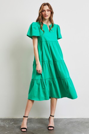 ED5379P<br/>SIMPLY BOLD, THIS MIDI DRESS TAKES IT TO A WHOLE NEW LEVEL WITH COTTON POPLIN TIERED RUFFLES & PUFF SHOULDERS