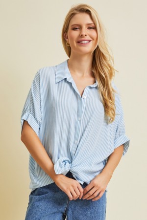 ET1706<br/>CAN NEVER HAVE TOO MANY BUTTON-DOWNS. THIS VERSATILE, CLASSIC OVERSIZED SHIRT IS FEATURED IN A PIN-STRIPED DESIGN.