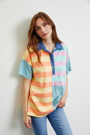 ET1812P<br/>EFFORTLESSLY EASY HENLEY TUNIC TOP FEATURED IN RETRO COLORBLOCKED STRIPES WITH A COLLARED NECKLINE & OVERSIZED FIT